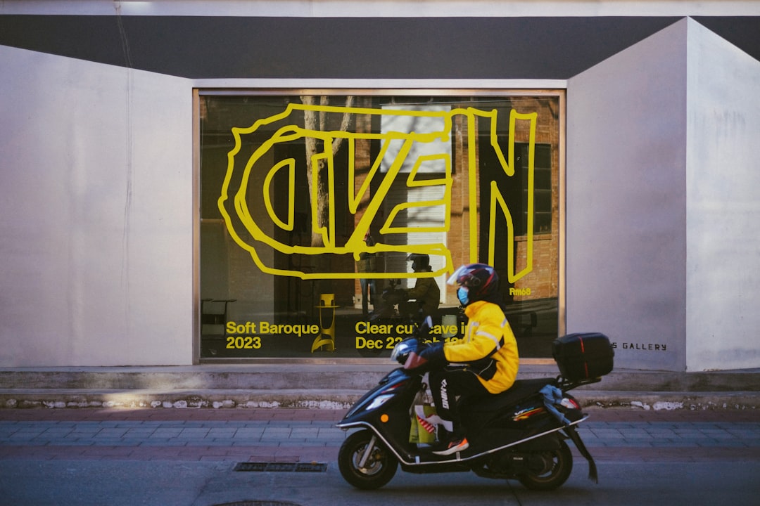 a person riding a motorcycle on a city street