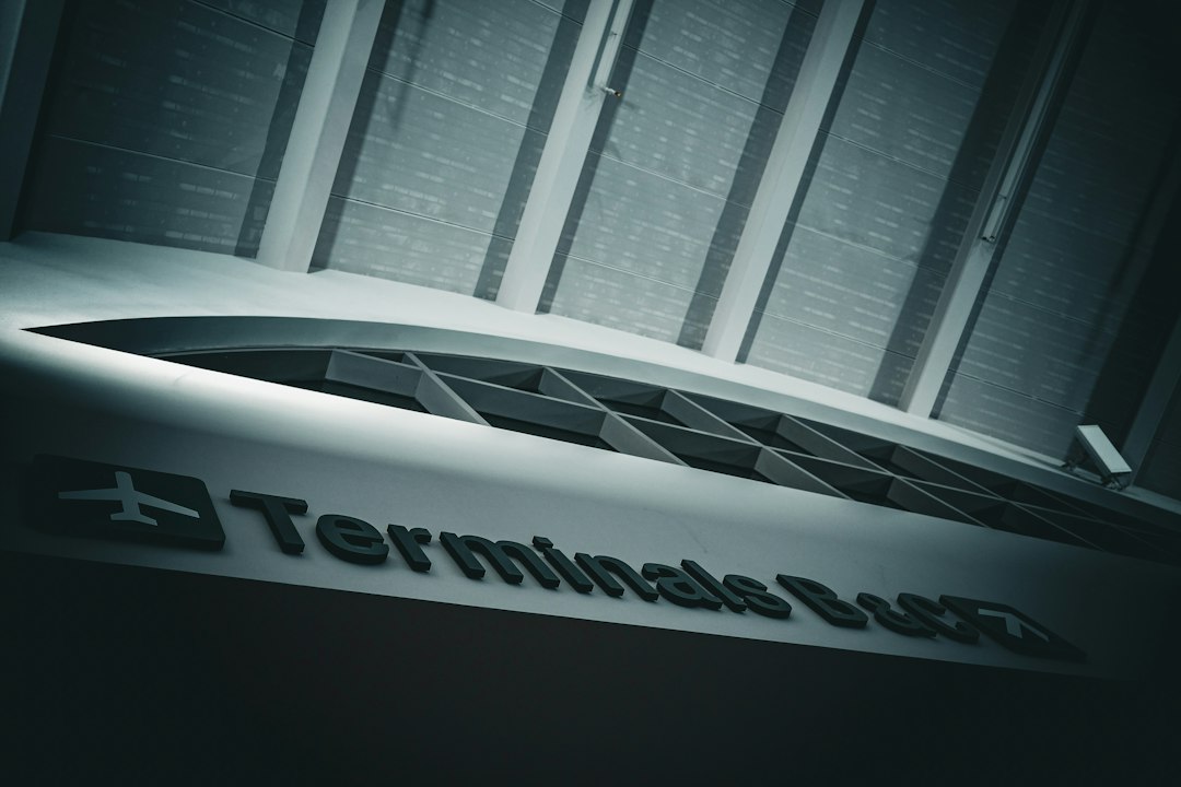 Modern airport terminal building with signage