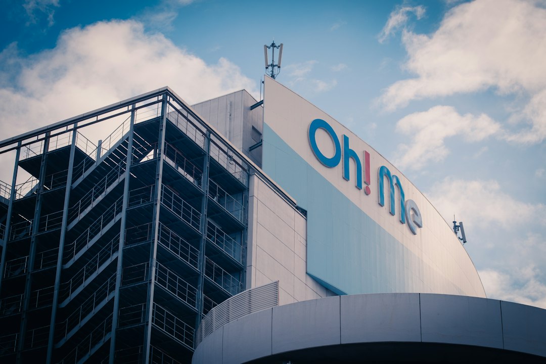 A large building with a sign on top of it
